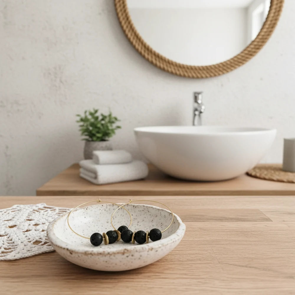 Lava oorbellen rond + etherische olie Pompelmoes